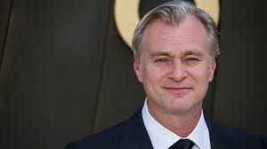Christopher Nolan on set with a large IMAX film camera during the production of his latest film The Odyssey.