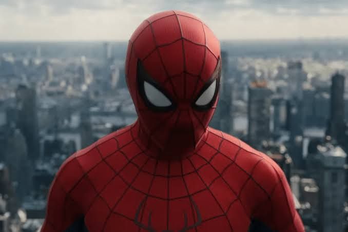 Tom Holland as Spider-Man preparing to fight the Hulk in a New York City setting.