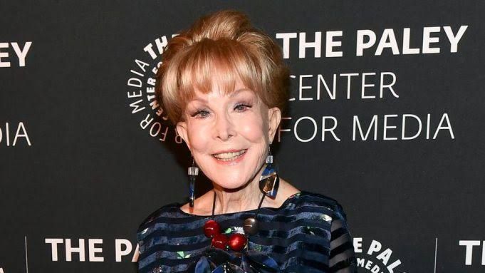 Actress Barbara Eden smiling during a formal event appearance before her Cinecon 62 festival cancellation.