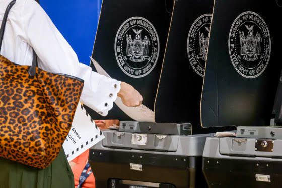 A voter registration form being processed at a county clerk office during an election cycle.