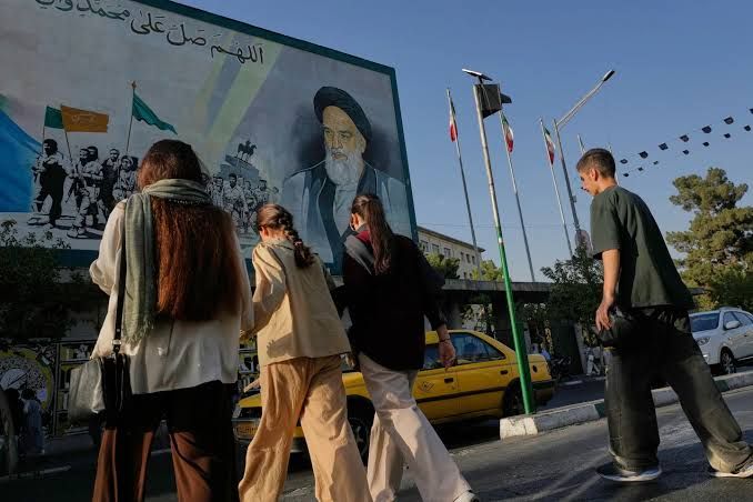 A mural of Ayatollah Khomeini above a Tehran street following the escalation of U.S.-Iran hostilities.