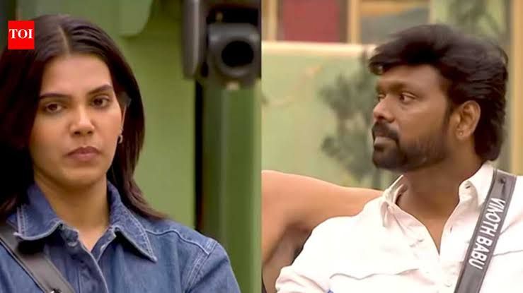 Shathiga and Vinoth Babu standing on the Bigg Boss Tamil 10 set during the first captaincy task announcement.