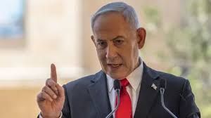 Benjamin Netanyahu gesturing during a public event in East Jerusalem.