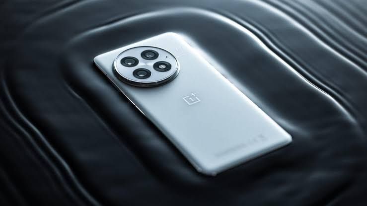 OnePlus smartphone on a dark background illustrating the transition of the brand into Oppo operations.