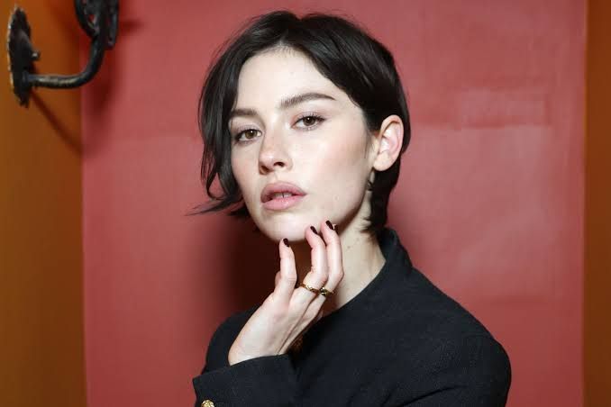 Gracie Abrams standing for a portrait in anticipation of her third studio album release.