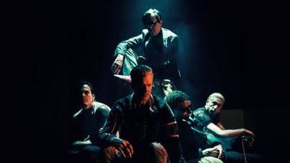 Queens of the Stone Age performing on stage during their 2026 tour to promote the new album Perfecth.