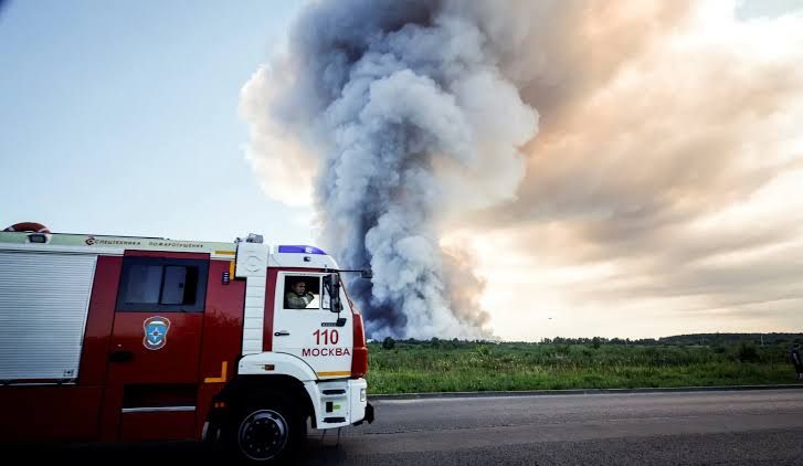 Smoke rises from a massive Wildberries logistics warehouse fire near Moscow following Ukrainian drone strikes.