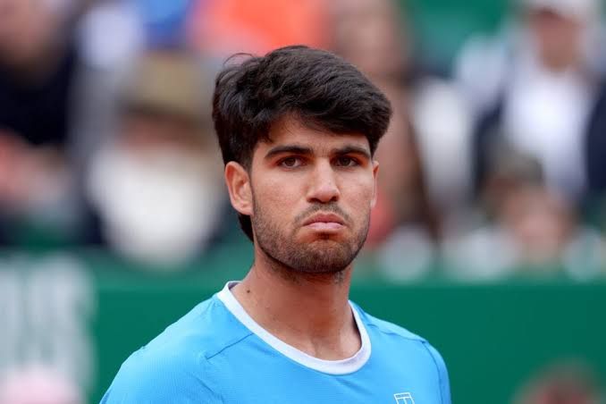 Carlos Alcaraz walking on court at the 2026 Monte Carlo Masters final.