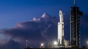 SpaceX Falcon Heavy rocket launching the Roman Space Telescope from Kennedy Space Center.