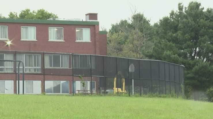 Signage and exterior view of the Solnit South youth psychiatric facility in Middletown, Connecticut.