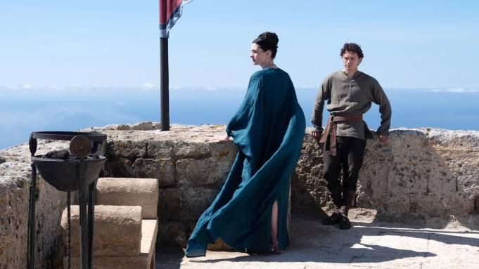 Anne Hathaway and Tom Holland in a scene from the film The Odyssey, currently in theaters worldwide.