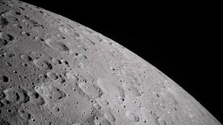 A SpaceX Falcon 9 rocket stage drifting through space before its predicted impact with the lunar surface.