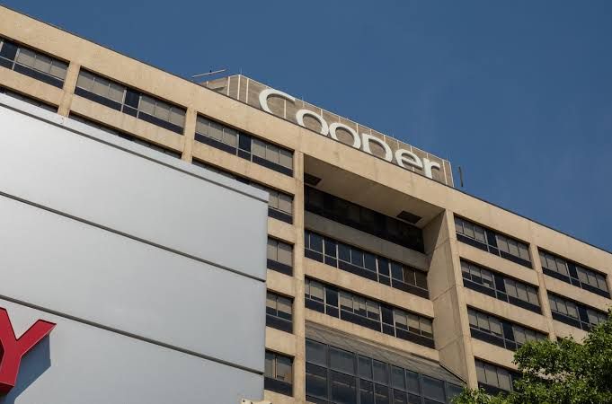 Hospital signage showing the RWJBarnabas Health logo at a clinical campus in New Jersey.