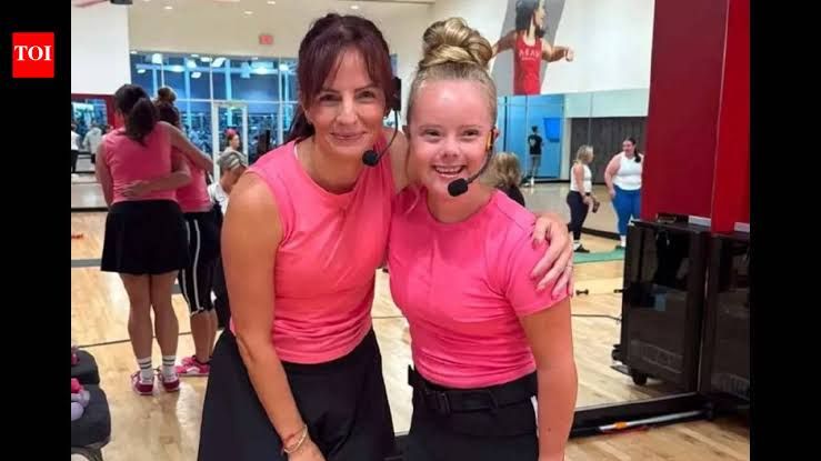 Aubry Allbridge, a 22-year-old fitness instructor, leading a group workout class at a gym in Kaysville, Utah.