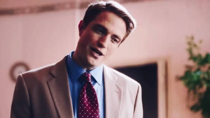 Robert Pattinson acting in the film Primetime, depicting host Chris Hansen during a scene from the movie.