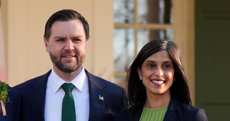 Vice President JD Vance and Usha Vance standing together at a formal public event.