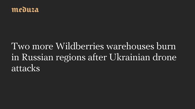 Aerial view of smoke rising from a damaged Wildberries warehouse facility following a drone strike.