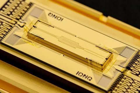 Close-up of a quantum processing unit inside a lab environment showcasing the technology utilized by IonQ.