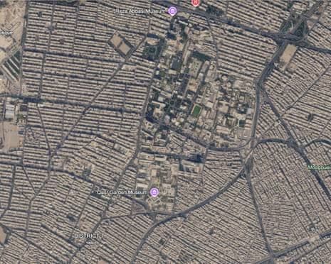 A Google Maps interface showing a satellite view of a city with a computer-generated overlay of a bomb crater.