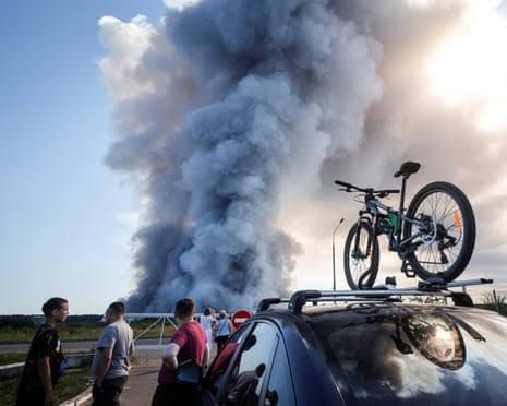 Smoke rises from industrial warehouses in the Moscow region following reported long-range drone strikes.