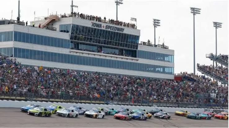 Empty grandstands at Iowa Speedway during preparations for the upcoming NASCAR race weekend.