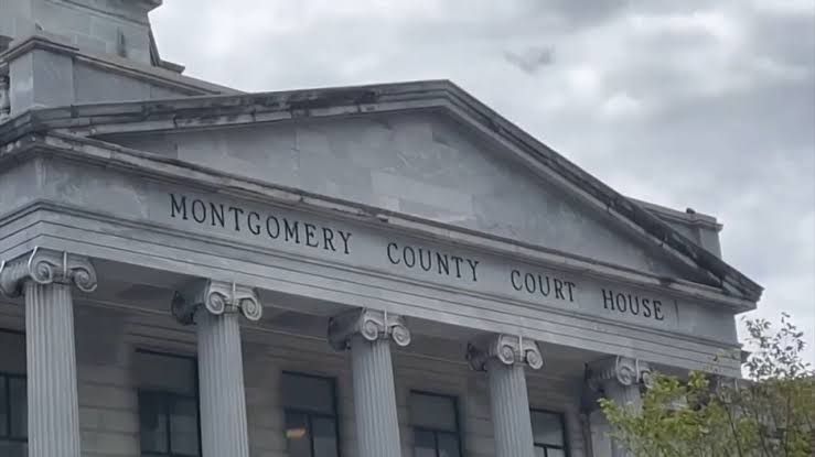 Montgomery County government building facade during a public announcement regarding the social media lawsuit.