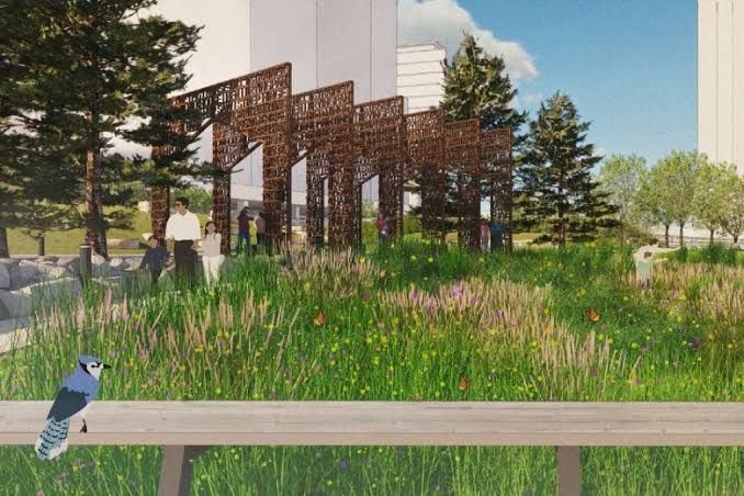 Architectural rendering of DuSable Park showing lush green walking paths and lakefront views near the Chicago River.