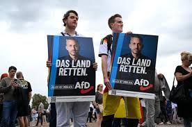 Candidate Ulrich Siegmund waves to supporters at a campaign rally in Magdeburg for the Saxony-Anhalt state election.
