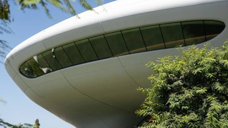 George Lucas and Mellody Hobson stand in front of the new Lucas Museum of Narrative Art in Los Angeles.