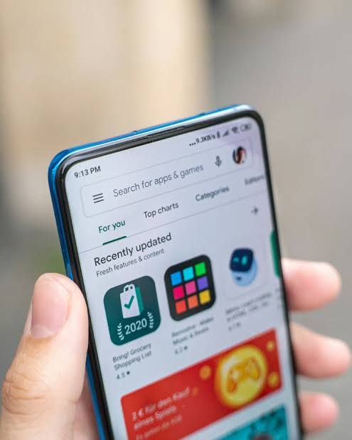The Google Play Store icon displayed on a smartphone screen representing the shift toward third-party store integration.