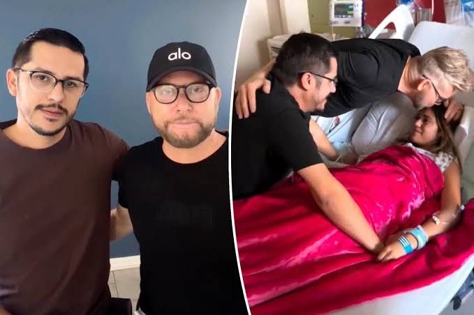 Kenneth Niedermeier and Armando Rubio visiting their daughter Hannah in an Arizona hospital room.
