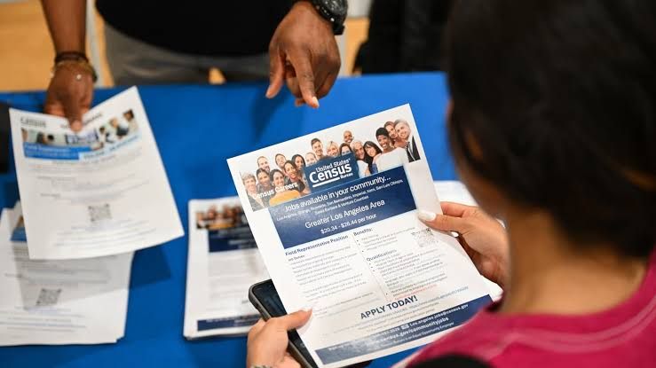 A job seeker at a recruitment fair in Los Angeles, California, during the July 2026 hiring event.