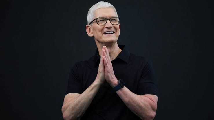 Apple and Nvidia logos side by side on a stock market screen showing fluctuating market capitalization values.