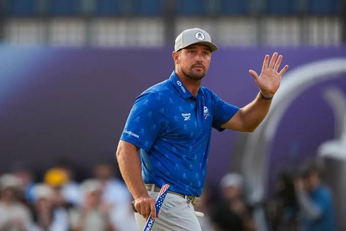 Lucas Herbert walks the fairway at Royal Birkdale during The Open Championship, where he currently holds the lead.