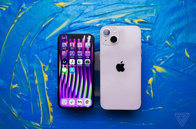 A pair of iPhones displayed on a clean surface, demonstrating the dual-device connectivity feature of iOS 27.