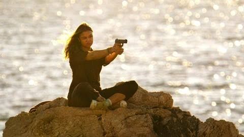 Madison Bailey as Kiara in a scene from the final season of the Netflix series Outer Banks.