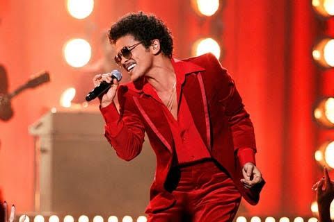 Bruno Mars performing on stage during the 2021 American Music Awards at the Microsoft Theater in Los Angeles.