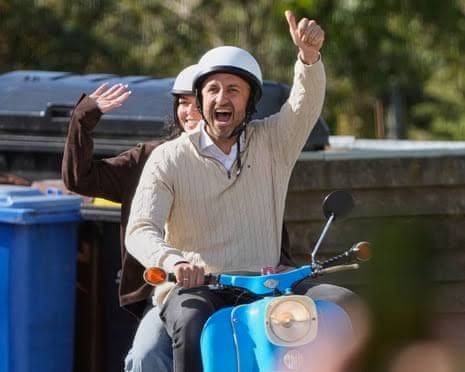 Ulrich Siegmund, the AfD state leader, arrives at a polling station on a moped with his wife.