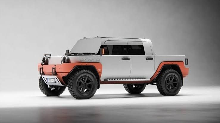 An angular, rugged, off-road concept vehicle designed for rural environments with integrated modular tool components.