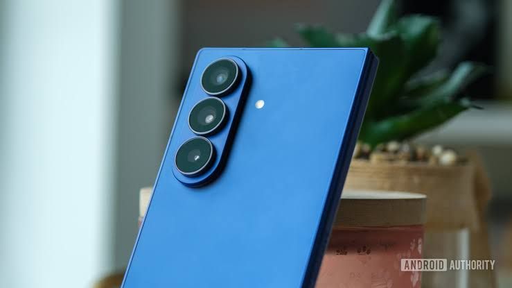 Close-up of Samsung Galaxy Z Fold camera array on a metallic smartphone back panel.