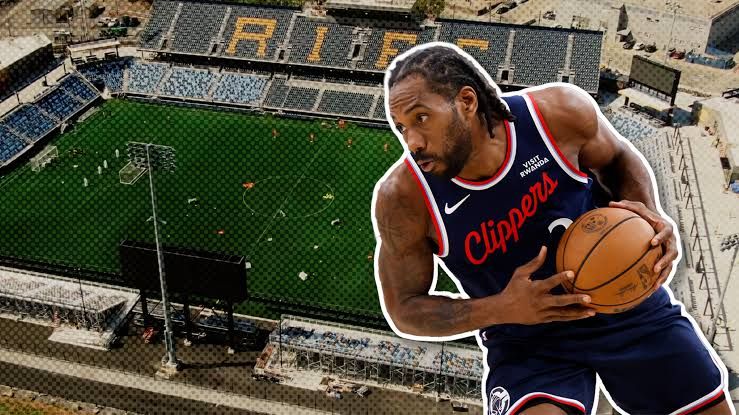 Kawhi Leonard pictured next to Rhode Island FC founder Brett Johnson during a discussion on the stadium project.