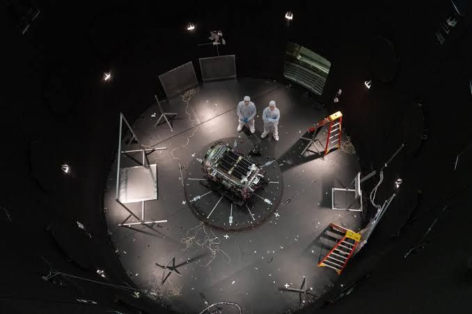 Katalyst Space Technologies workers inspect the Link spacecraft during thermal testing at NASA’s Goddard facility.