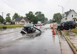 Toledo police investigate a collision involving a car and a silver sedan on North Detroit Avenue.