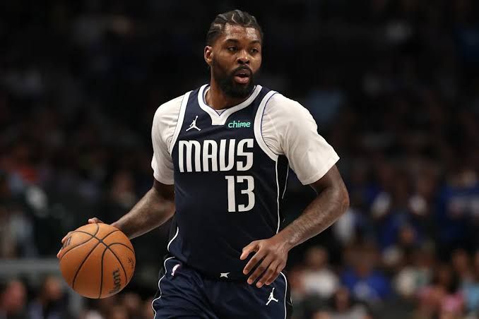 Dallas Mavericks forward Naji Marshall playing during a professional basketball game.
