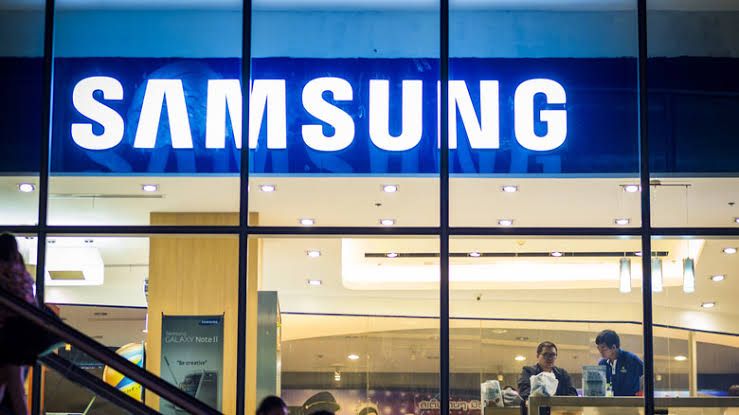 Samsung store signage featuring the brand logo against a blue background.