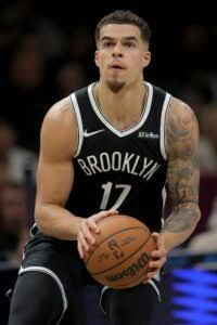 Forward Michael Porter Jr. wearing a Brooklyn Nets jersey during an active play on the court.