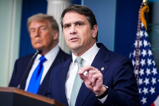 Deputy Attorney General Todd Blanche in the White House briefing room alongside President Donald Trump.