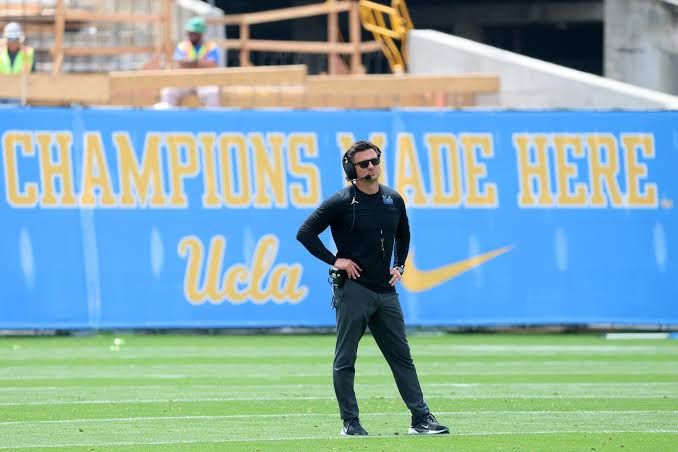 UCLA coach Bob Chesney speaks with reporters after the team spring game at the Rose Bowl.