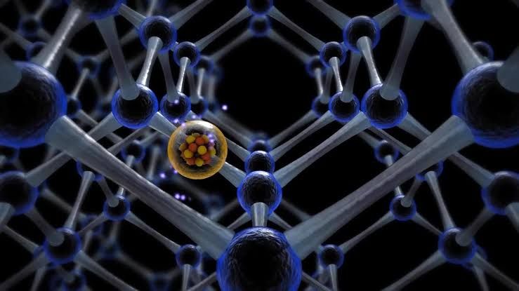 Close-up of a silicon chip substrate used for quantum research in a laboratory setting.