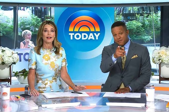 Savannah Guthrie and Craig Melvin sit together at the Today show desk during a broadcast.